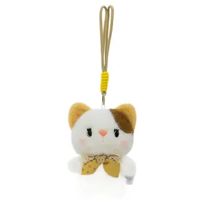 Cute plush kitten charm with yellow polka dot bowtie and lanyard for school bags