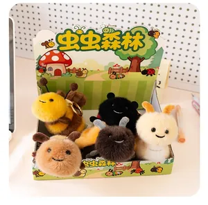 Set of cute plush insect keychains in a colorful forest theme display box