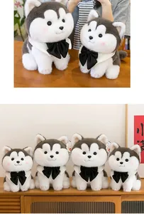 A group of cute plush husky dog dolls with black bow ties on a natural wooden surface