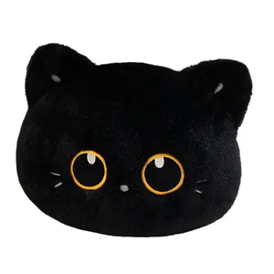 Cute round black cat head plush pillow with large yellow eyes and soft fuzzy texture