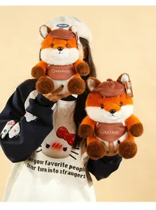 Detail of Maillard style fox plush toys with cute hats and Chocolate bibs