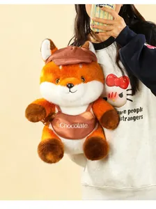 Detailed view of Maillard series plush fox doll with a chocolate embroidered bib