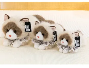 Detail of three Ragdoll cat plush toys in different sizes with decorative lace collars