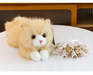 Close-up detail of fluffy plush cat toy with decorative lace bow collar accessory