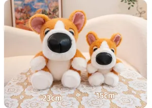Pair of cute big-nose plush dogs in 23cm and 15cm sizes displayed on lace tablecloth