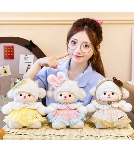Set de tres adorables peluches de oveja en vestidos de encaje de colores con lazos a juego