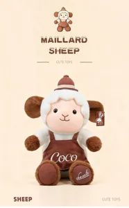 Dettaglio del peluche a forma di pecora Maillard con grembiule marrone