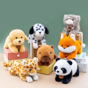 Collection of cute plush animal toys including panda, fox, and dog on colorful boxes