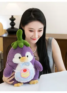 Cute purple eggplant penguin plush doll held by a model in a cozy lifestyle setting