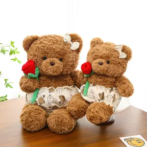Kuscheliges Paar braune Teddybären Plüschtiere mit roten Rosen als Valentinstagsgeschenk