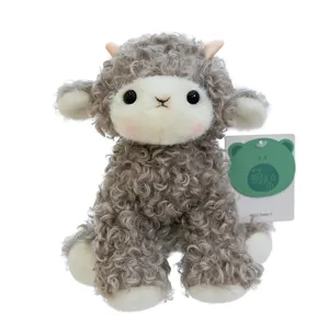Soft curly grey lamb plush toy with cute horns and pink cheeks on white background