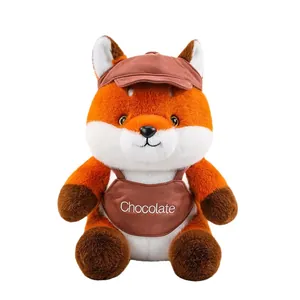 Adorable cartoon fox plush toy wearing a brown hat and apron for kids gift.