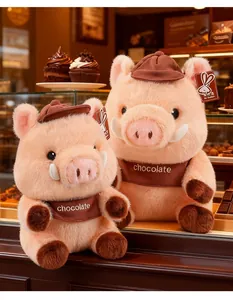 Two cute Maillard pig plush toys wearing brown hats in a dessert shop setting