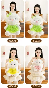 Comparison of plush lamb dolls in four sizes held by a model for visual scale.