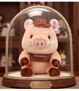 Detailed view of cute Maillard style pig plush toy inside a glass display dome