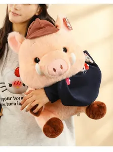 Asian model holding a cute Maillard style pink plush pig toy with a brown hat and navy outfit