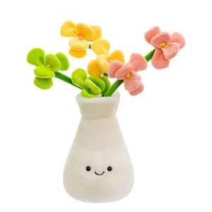 Simpatico peluche a forma di tulipano in vaso con viso sorridente, regalo decorativo.