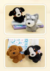 Detail of cute plush dog keychains showing soft textures and puppy breeds.