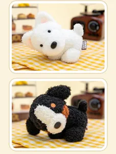 Detailed display of cute white and tricolor plush puppy dog charms in a cozy scene