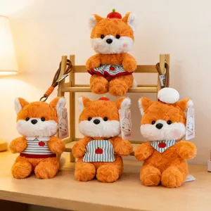 Set of four cute orange plush fox keychains with adorable outfits for bag decoration