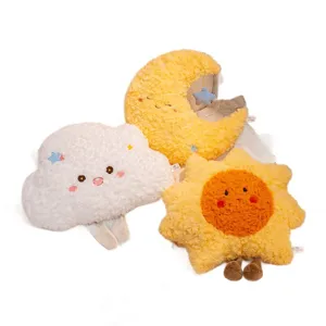 Adorable plush pillow set featuring smiley cloud, crescent moon and sun shapes for home decor