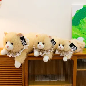 Set of three fluffy ginger and white plush cat dolls wearing elegant lace collars