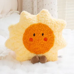 Soft yellow sun-shaped plush pillow doll with cute face and fuzzy texture for kids