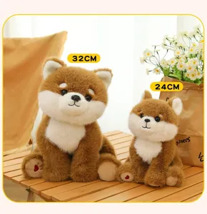 Pair of cute Shiba Inu plush dog toys in 32cm and 24cm sizes sitting on a wooden table.