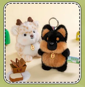 Detailed view of cute puppy and deer plush toy keychains with soft faux fur texture