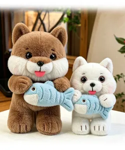 Detailed view of two cute cat plush toys holding blue fish, soft textured fabric