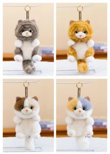 Close-up of four colors of long-haired cat plush keychains with JSQ TOYS strap.