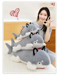 Cute creative shark dog hybrid plush toys in three sizes with Asian model posing