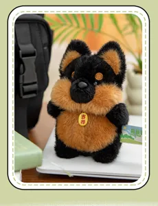 Close-up of fluffy black and brown dog plush toy with auspicious medallion