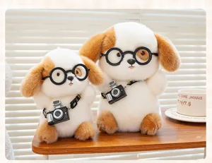 Detailed view of two cute plush dog toys wearing glasses and cameras on a wooden table.
