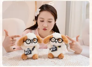 Cute puppy plush toy with glasses and camera prop shown in a cozy home setting