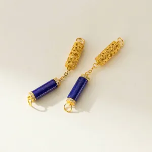Close-up of 925 silver gold-plated hollow filigree and lapis lazuli jewelry connector