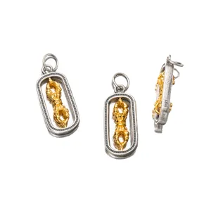 Detailed view of three 925 silver Vajra pendants with rotating golden center and S925 hallmark