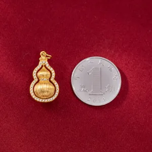 Close-up of gold-plated sterling silver gourd pendant with micro-set zircons for DIY jewelry