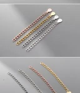 Macro detail showing S925 sterling silver extension chains in gold and rose gold