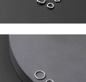 Macro detail of S925 sterling silver open and closed jump rings for jewelry making