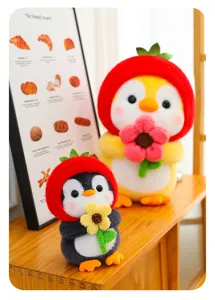 Close-up of cute strawberry penguin plush toys holding flowers on a wooden shelf
