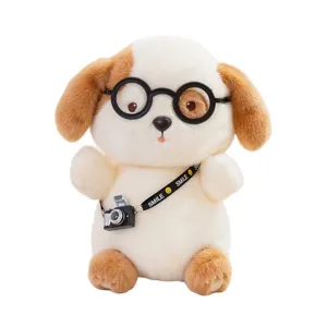 Cute puppy plush toy with glasses and camera, soft stuffed animal for kids.