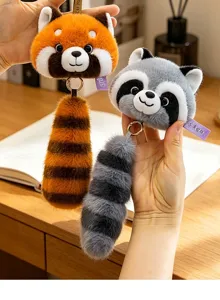 Plush red panda and raccoon keychain pendants with striped tails for bag decoration.