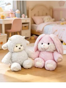 Cute plush lamb and pink bunny toys sitting together in a cozy bedroom setting.