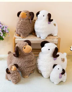 Detail view of cute big-horn ram plush toys in multiple sizes and two colors. Soft texture.