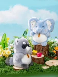 Detailed shot of cute elephant and raccoon plush toys in a miniature forest setting