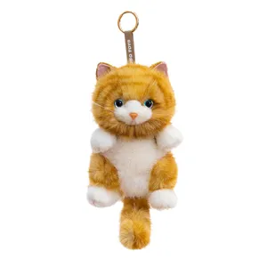 Cute ginger cat plush keychain with realistic long fur and soft white paws