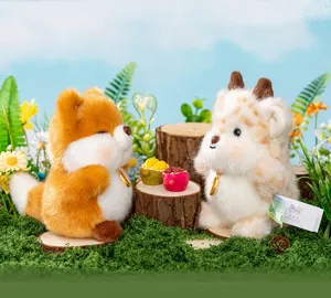 Two cute fluffy animal plush toys in a miniature forest scene setting