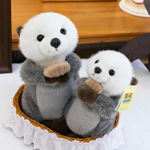 Two adorable magnetic sea otter plush dolls set for cozy home decor and gift giving