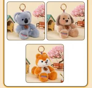 Detailed view of various forest animal plush keychains including a dog, koala and fox